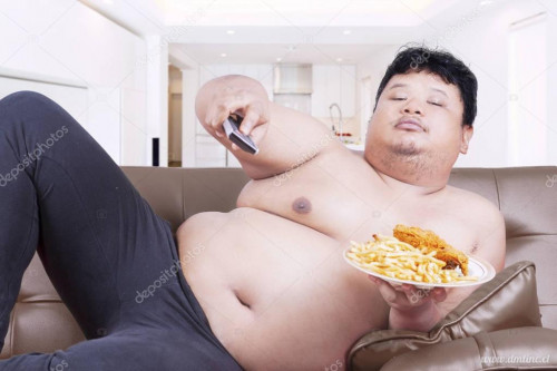 depositphotos 130429698 stock photo obesity person watches tv at